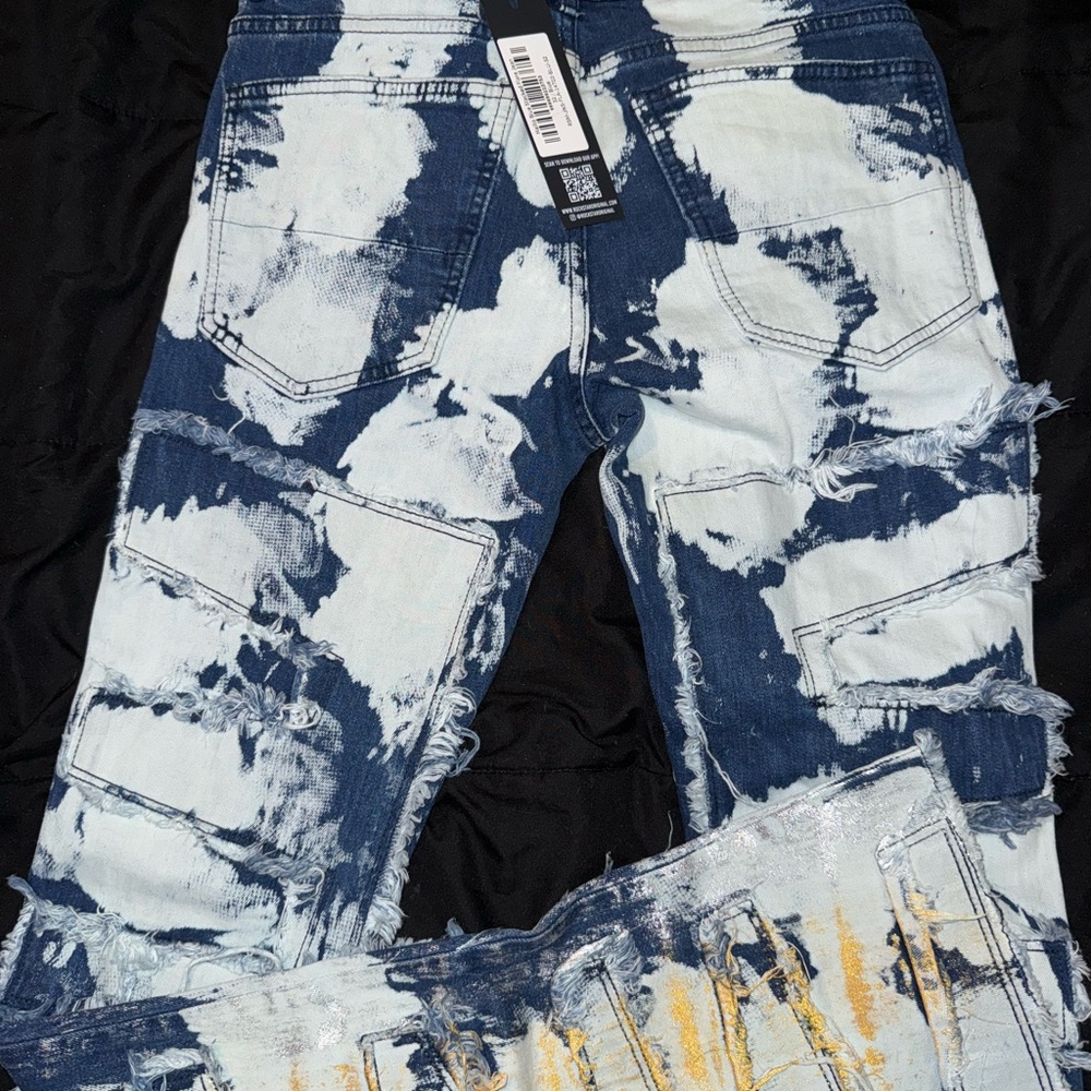 Blue and White Distressed Jeans with Rips and Frayed Hem